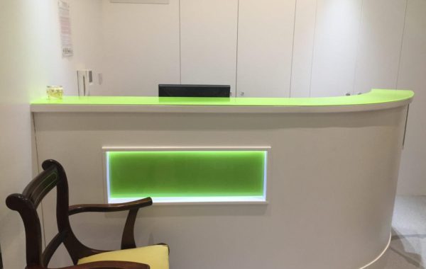 Green glass splashback for reception