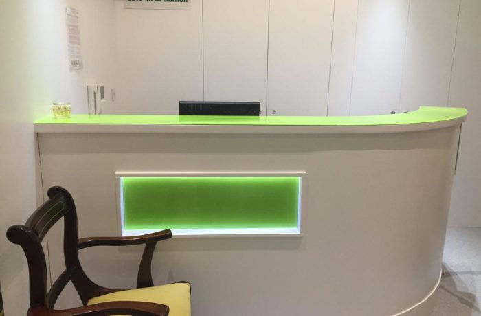 Green glass splashback for reception