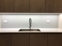 White glass kitchen splashback