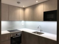 White glass kitchen splashback
